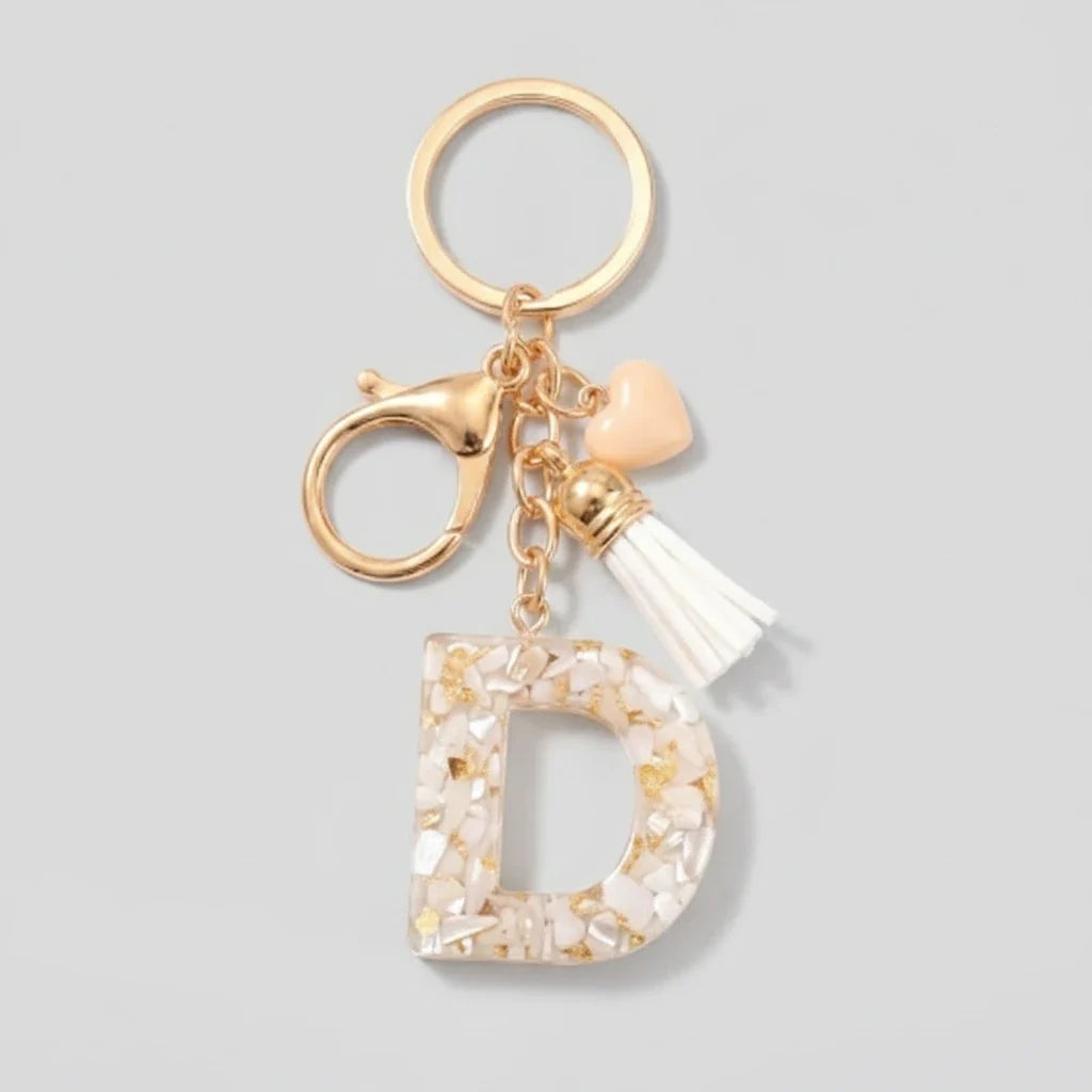 Porte-clés beige avec initiales, lettre D