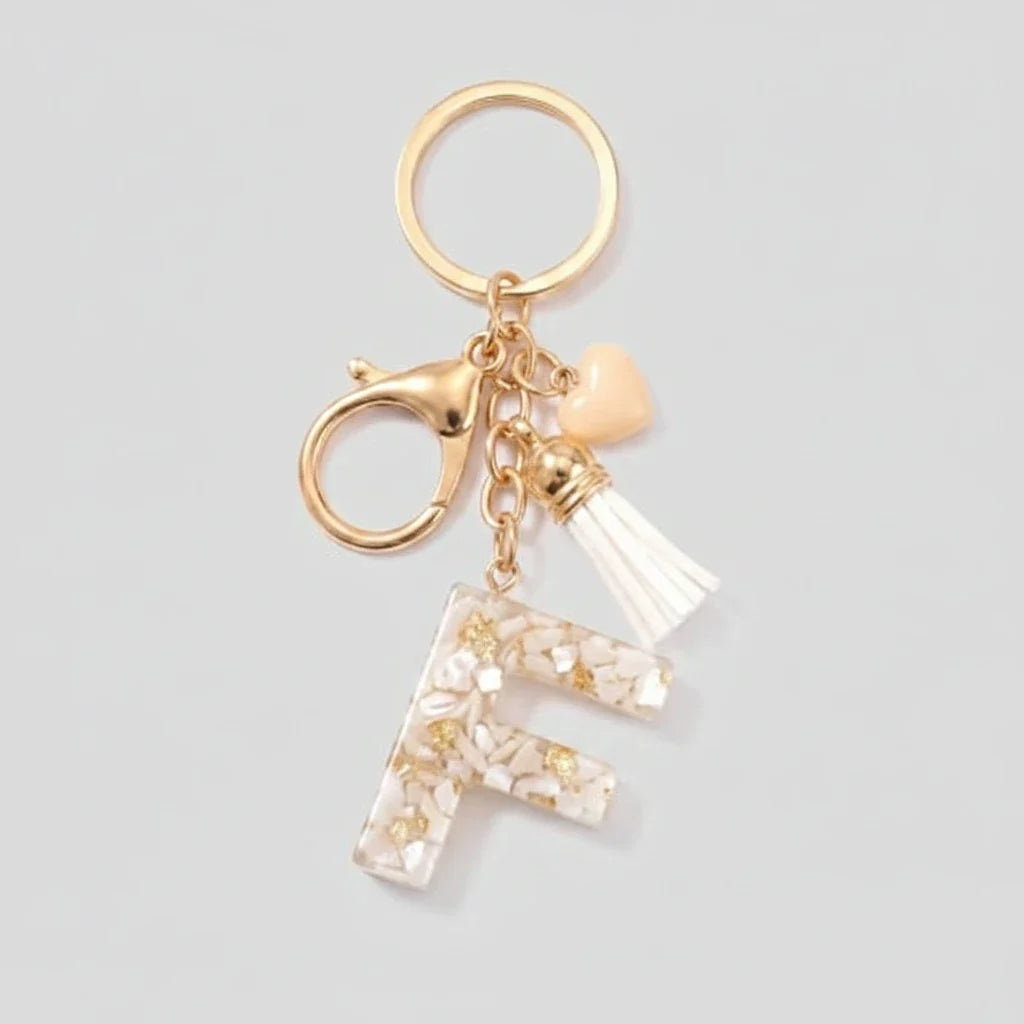Porte-clés beige avec initiales, lettre F