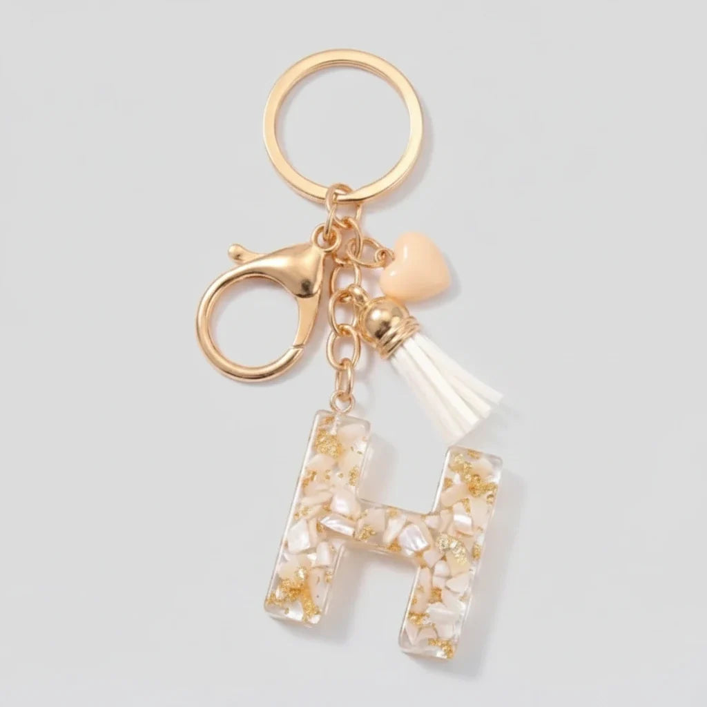 Porte-clés beige avec initiales, lettre H
