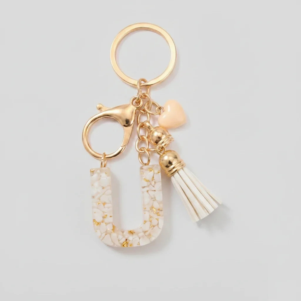 Porte-clés beige avec initiales, lettre U